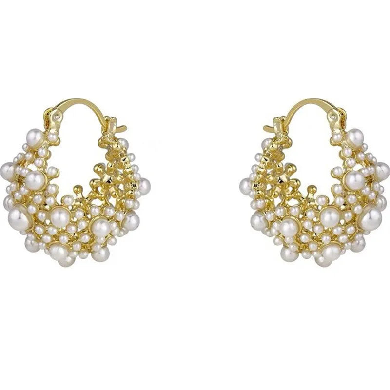 Gold-coloured copper flower basket earrings with pearl inlay and small rice-shaped bead detailing