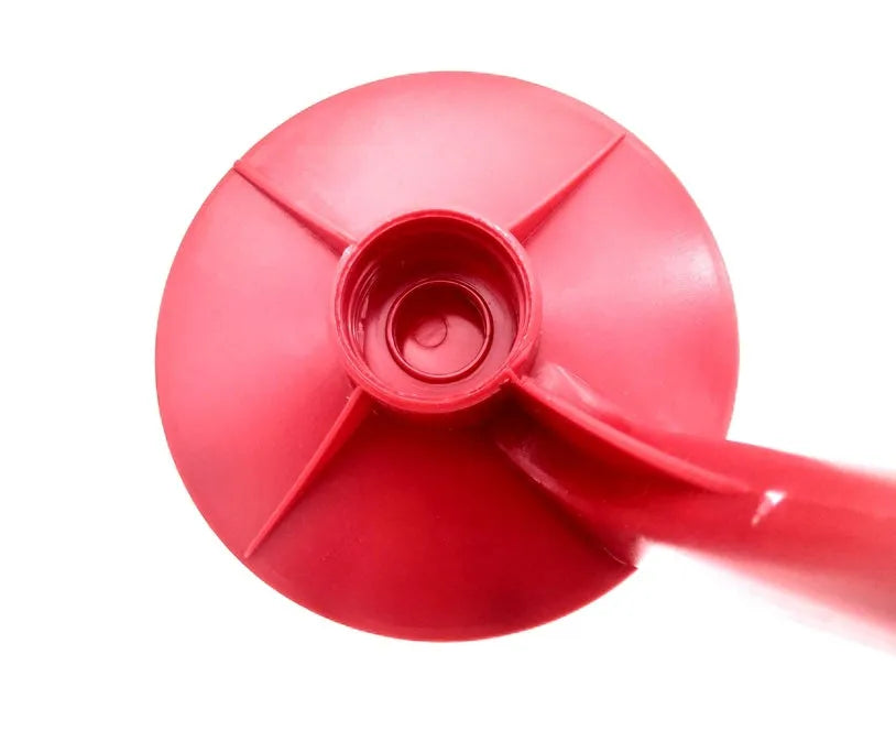 Red plastic Magic Tap soda dispenser for 2-litre bottles.