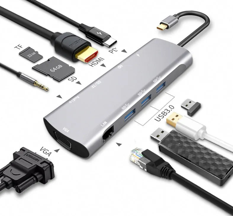 Grey aluminium USB-C docking station with HDMI, VGA, USB ports, and a short connecting cable