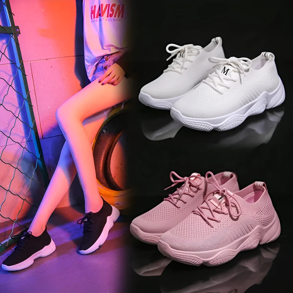 Women's white sport shoes with thick rubber soles and woven upper fabric with front strap closure