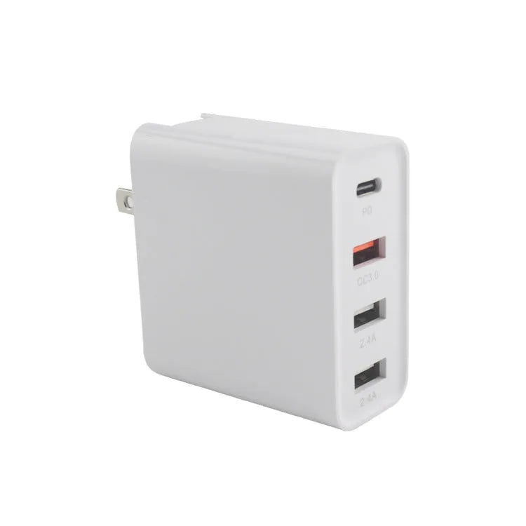Black 48W four-port USB-C desktop charger with UK plug on a white background.