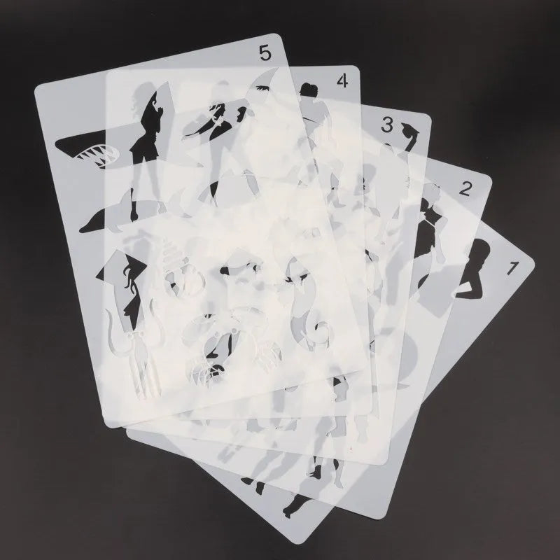 White plastic drawing stencil template for tracing animals, shapes, and vehicle patterns
