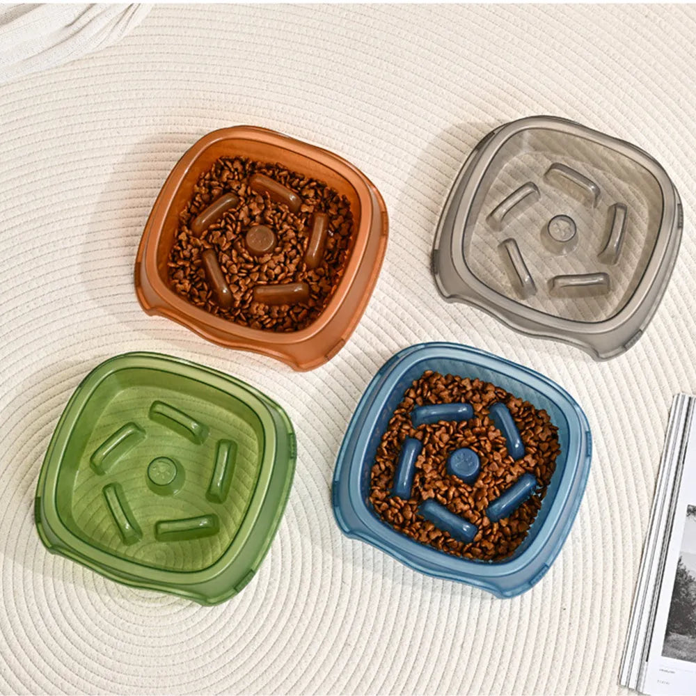 Plastic dog slow feeder bowl with anti-choking ridges in blue, grey, green, and orange colour options