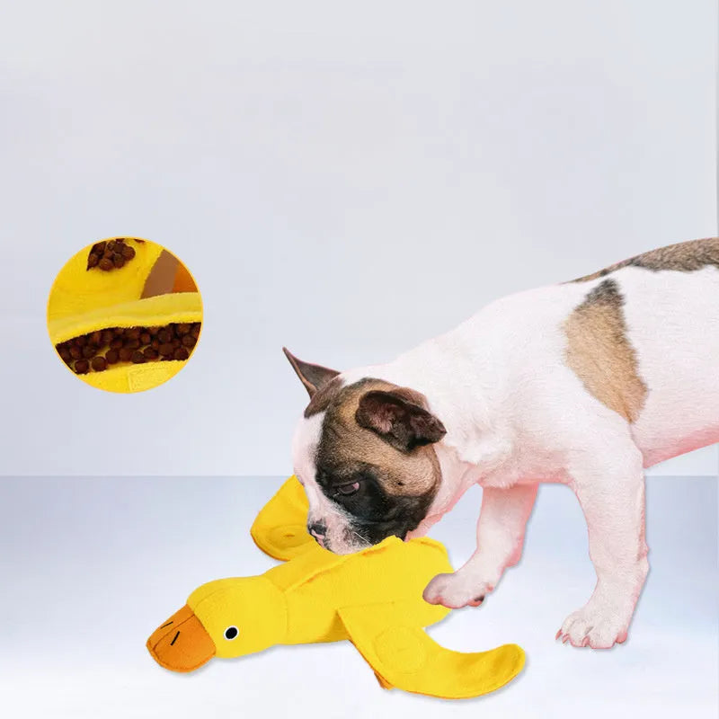 Yellow teddy dog toy with duck sound feature and treat dispensing openings for training