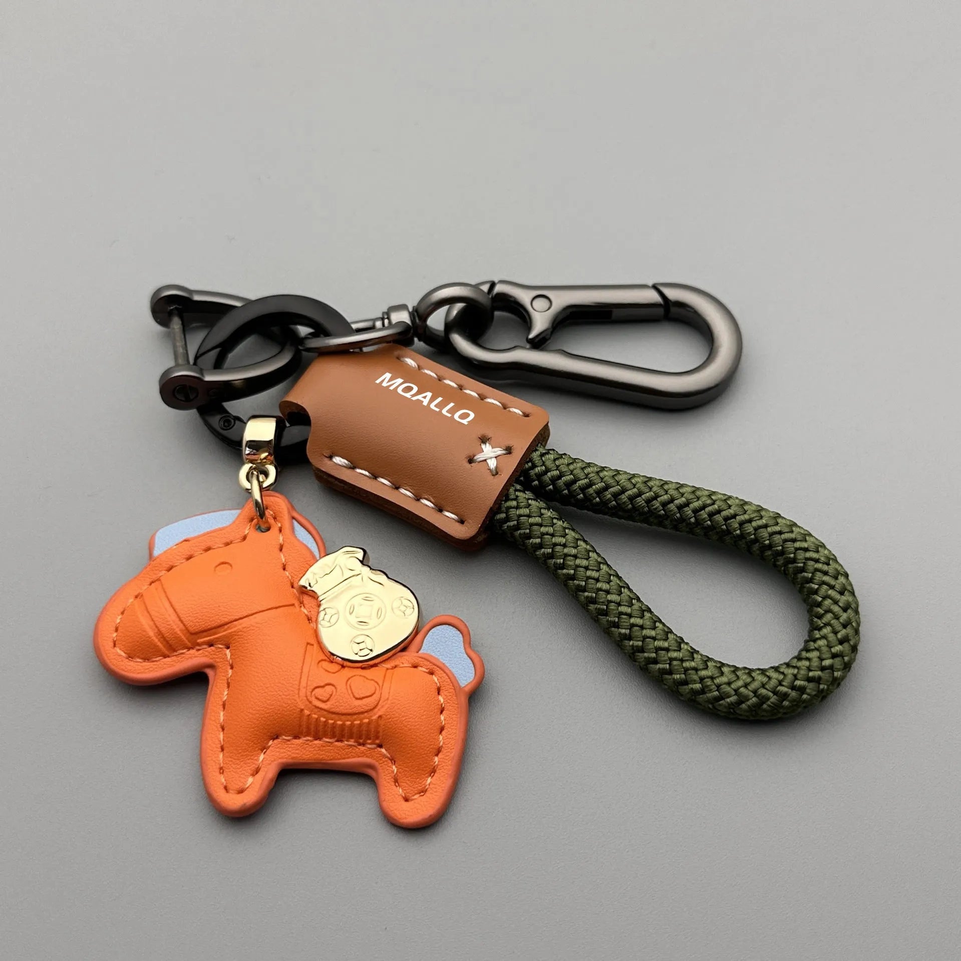 Cowhide car key ring pendant with zinc alloy pony belt buckle on flanelle rope in various colour options
