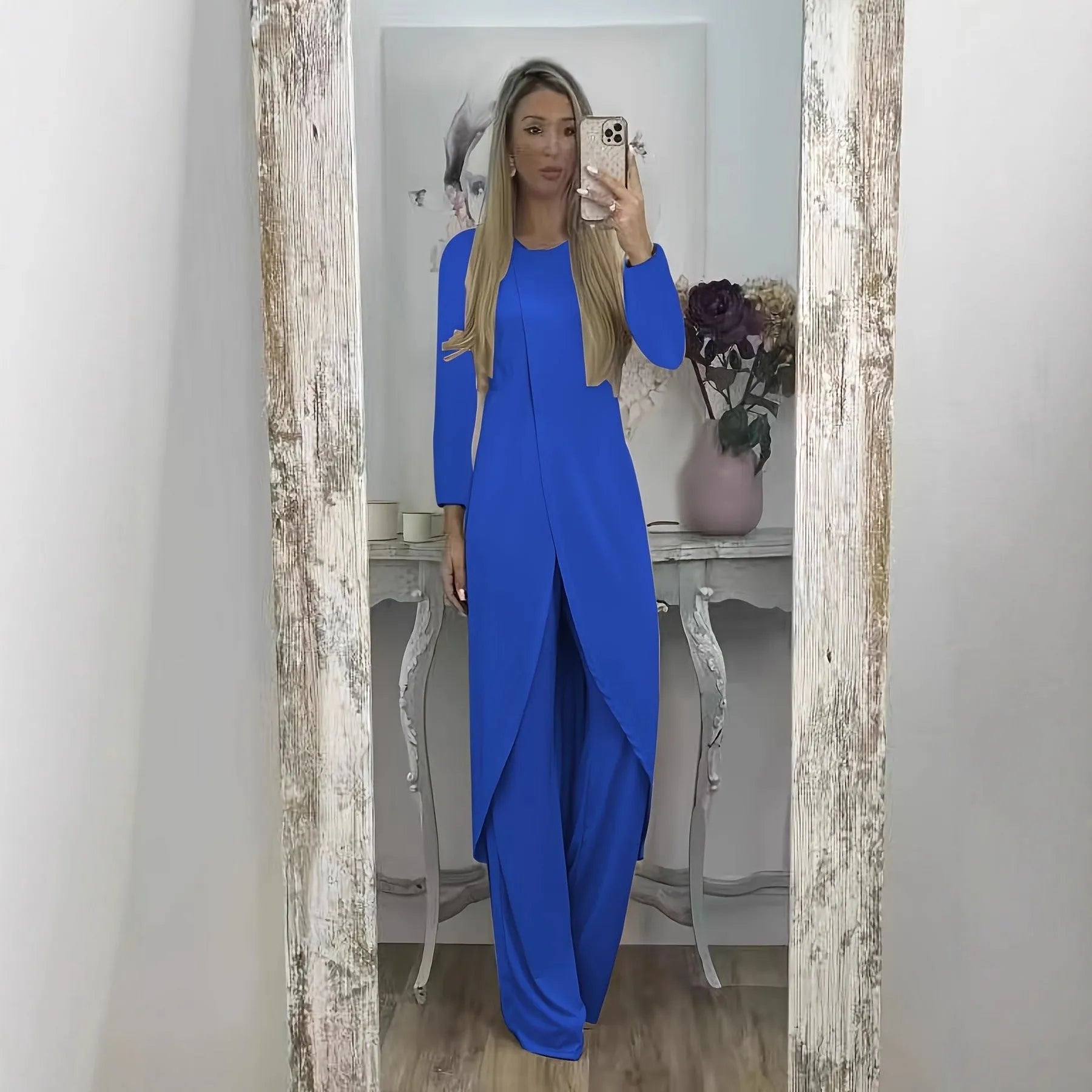 Casual long sleeve two-piece set with loose round neck top and matching trousers in polyester