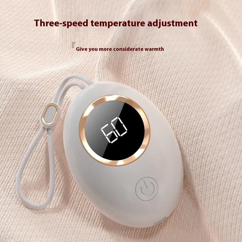 USB digital display hand warmer power bank in pink, showing aluminium heat dissipation design.