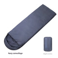 Navy blue envelope camping sleeping bag for adults with hollow cotton filler.