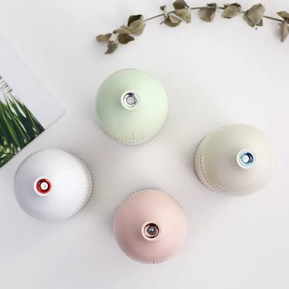 White USB aromatherapy diffuser and humidifier with LED light, 300ml capacity, 80mm cube dimensions.
