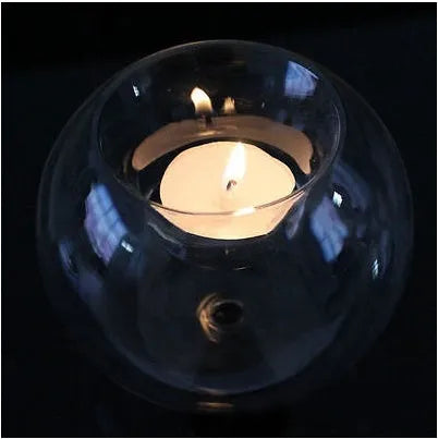 Round hollow glass candle holder showing handcrafted European-style spherical design