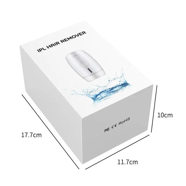 White home laser hair removal device with digital display and compact handheld design on a plain background.