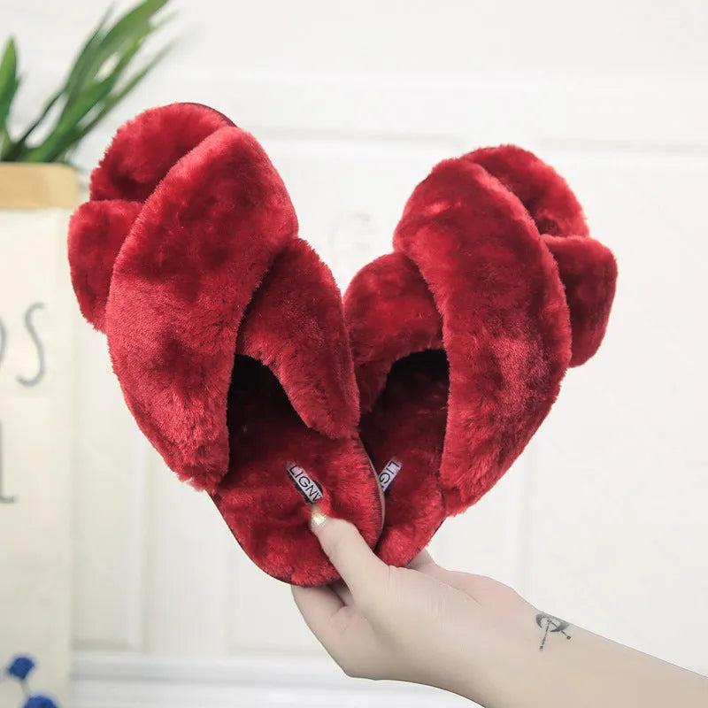 Cross open-toe fur slippers in multiple colours showing patterned sole and anatomical heel.