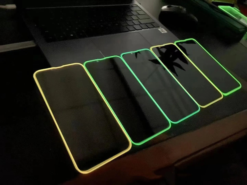 Fluorescent tempered glass screen film for iPhone showing luminous green glow effect