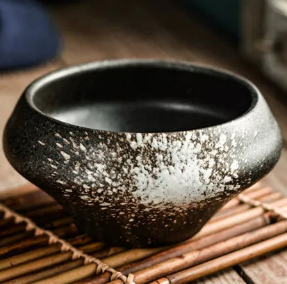 Tall porcelain Japanese soup bowl with stone conch shape and underglaze retro pattern.