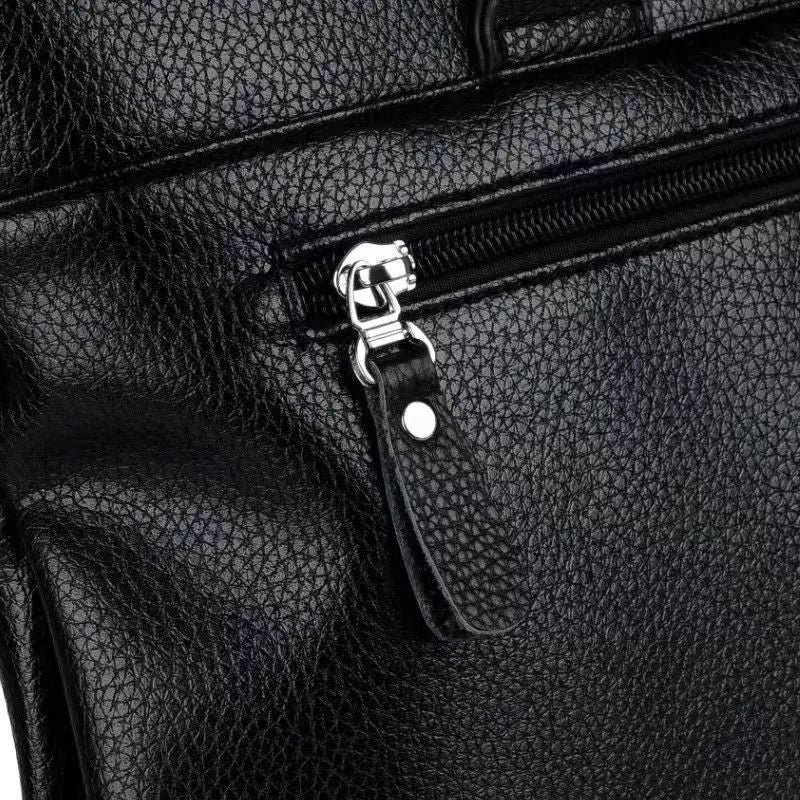Men's black and brown PU leather business messenger bag with splicing style, shown with crossbody strap.