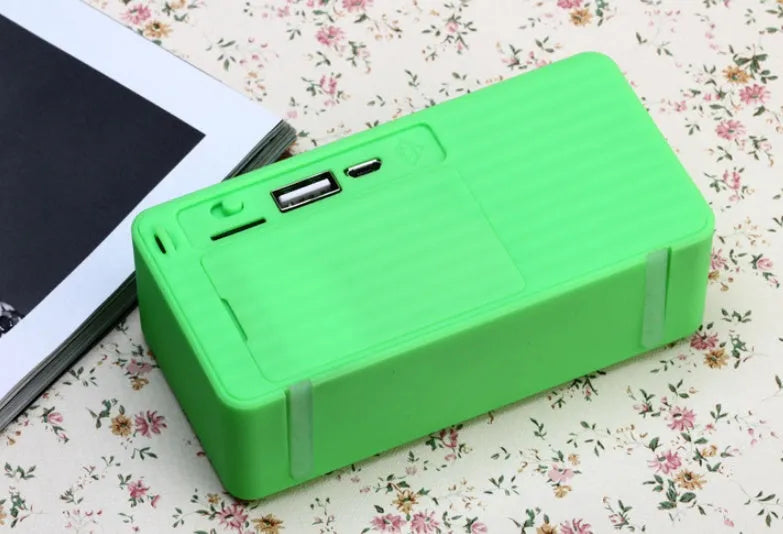Cannon X3 mini cube portable Bluetooth speaker in colour options on a neutral background