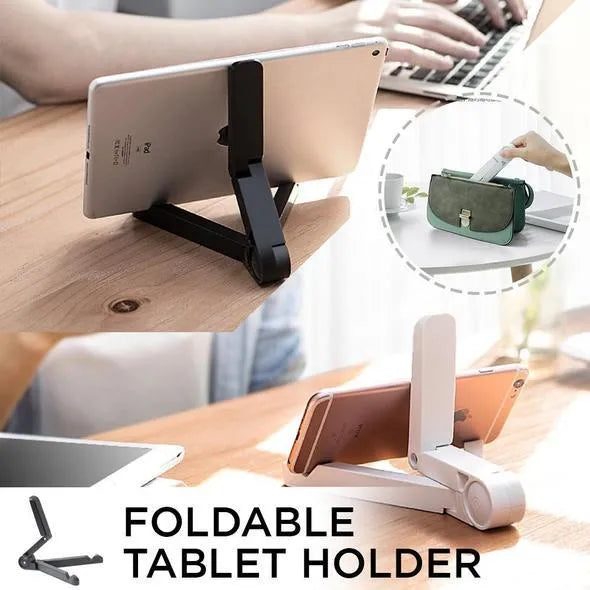 Black foldable tablet holder open in landscape mode holding a smartphone, showing its adjustable angle and non-slip base.