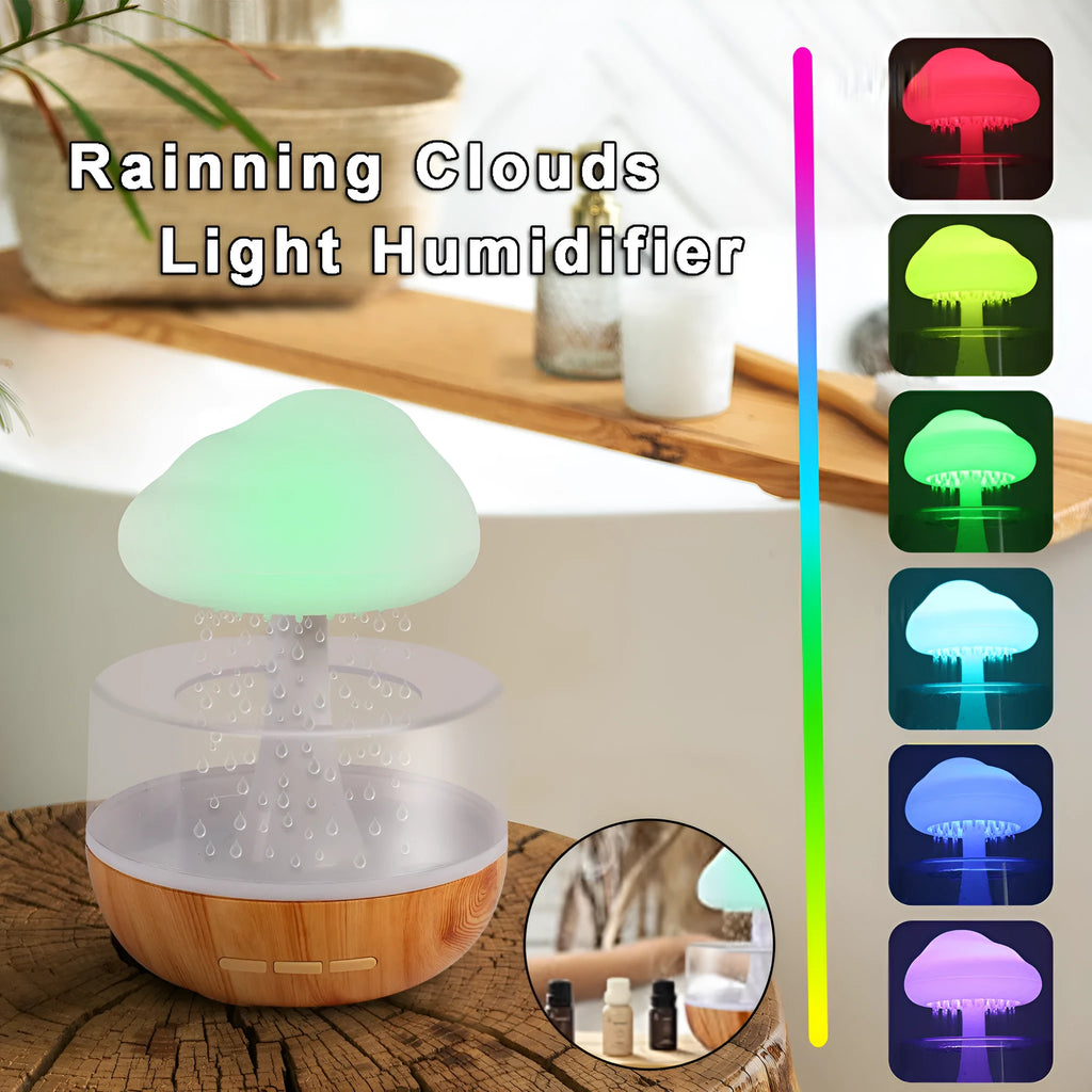 White cloud-shaped humidifier with LED night light on a table