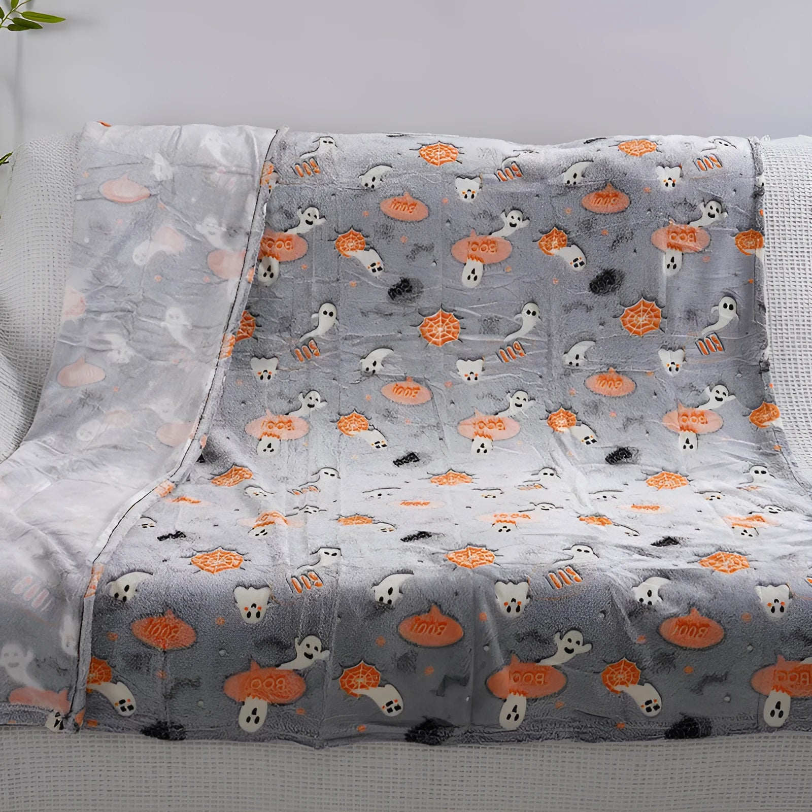 Cartoon-style flannel blanket for children shown as an air conditioner cover and bed throw.