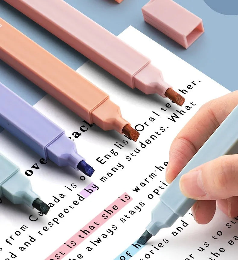 Set of double-headed fluorescent marking pens with refillable cartridges, showing chisel and bullet tips, in a mix of bright colours.