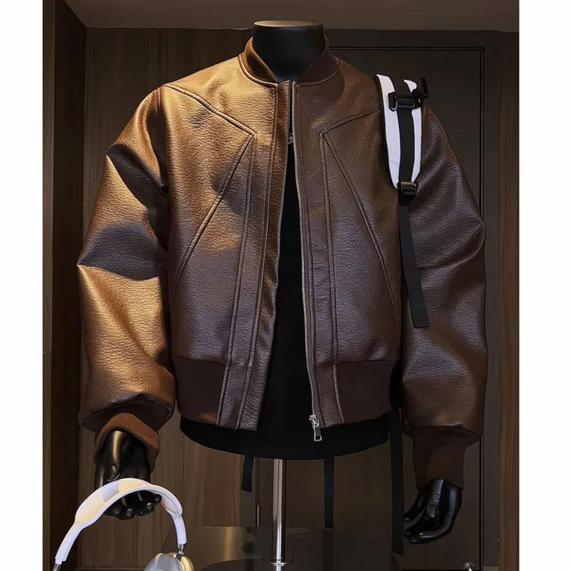 Men's black extended length PU leather jacket with litchi grain texture, shown in a tight business fit.