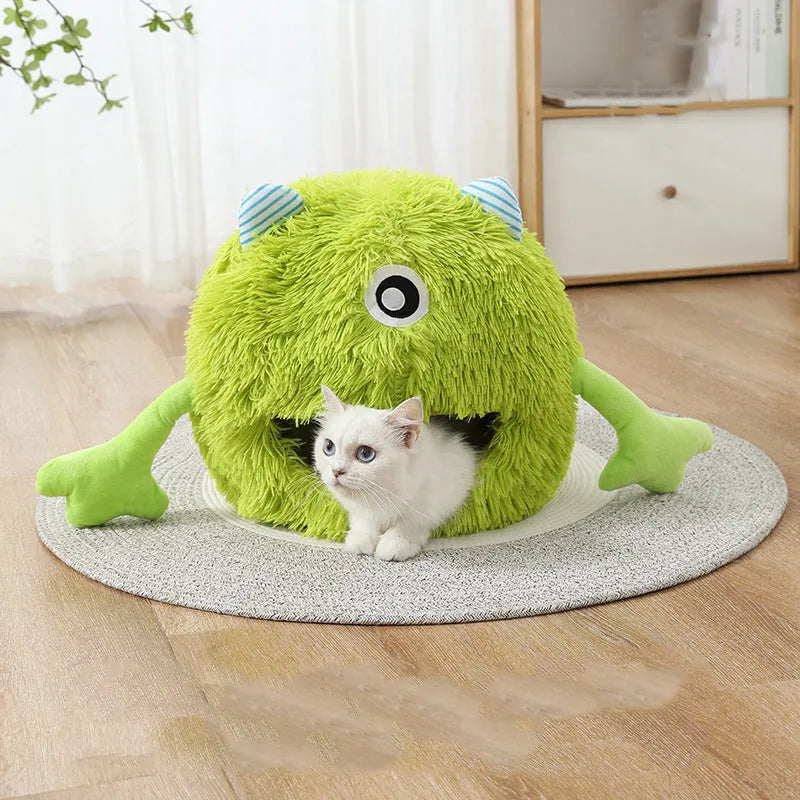 Round fluffy cat bed for indoor cats with self-warming feature and non-slip base