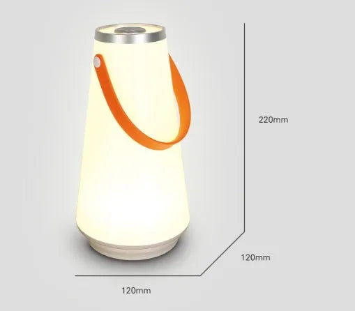 White rechargeable LED table lamp with adjustable warm light settings and USB charging cable