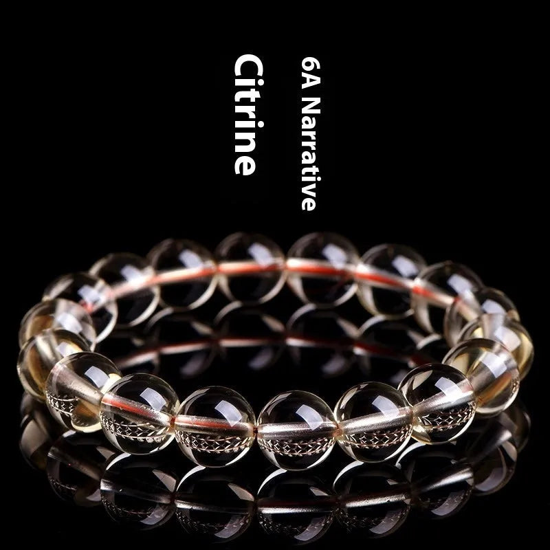 Natural citrine scattered beads ball bracelet showing 7A and 6A colour grade options on a wrist.