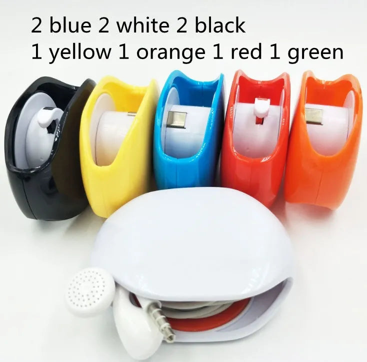 Automatic earphone cable winder retractor in PC ABS plastic, showing compact size and multiple colour options.