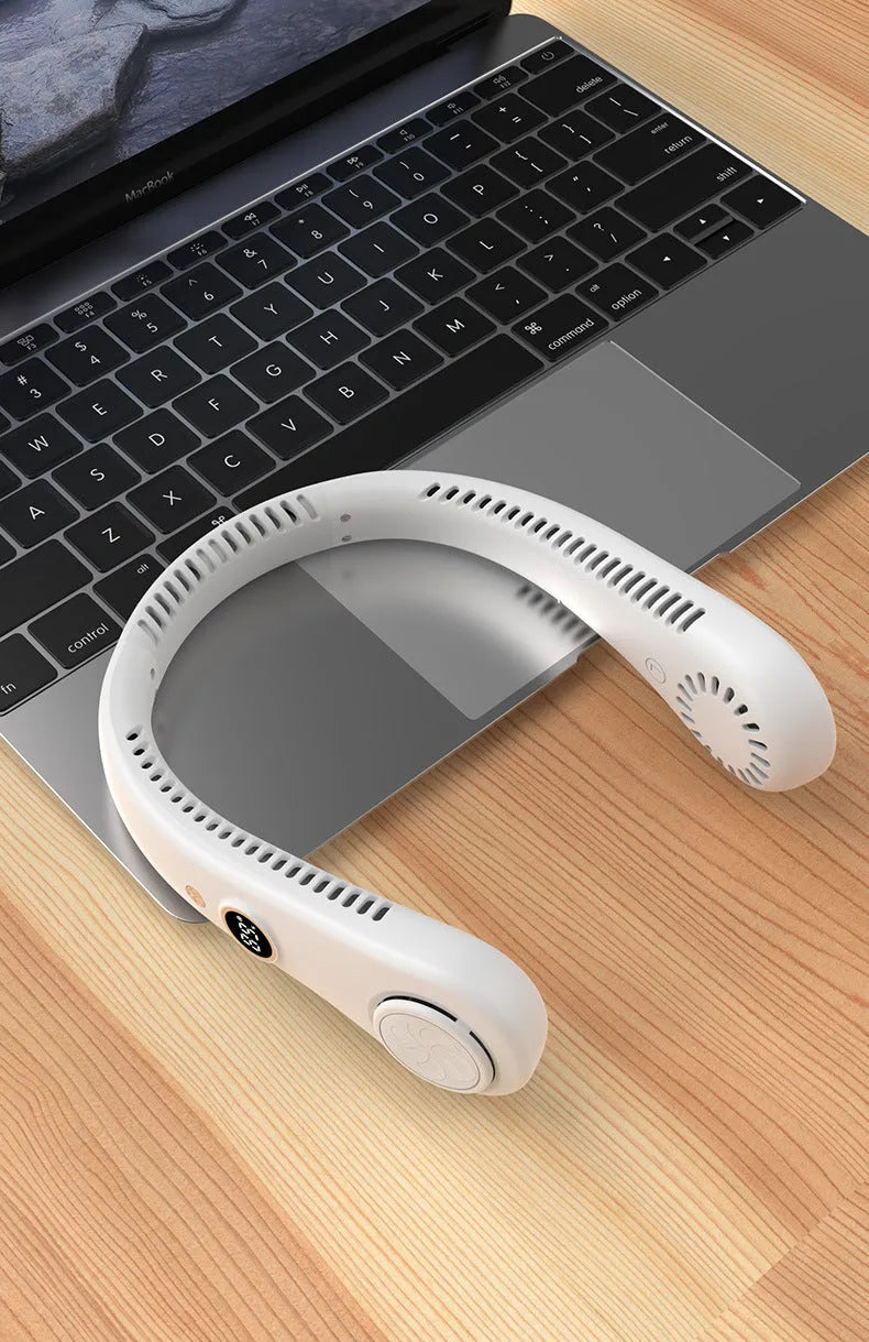 Pink portable bladeless neck fan with flexible neckband and USB charging cable