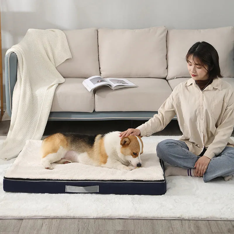 Brown removable washable memory sponge dog mattress pad on a wooden floor.