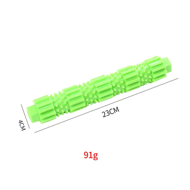Green and orange durable rubber dog chew toy with treat dispenser for aggressive chewers