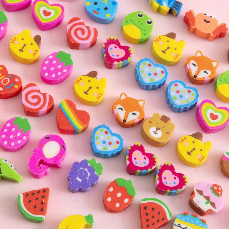 Assortment of 50 colourful miniature cartoon erasers including fruit, animal and theme designs.