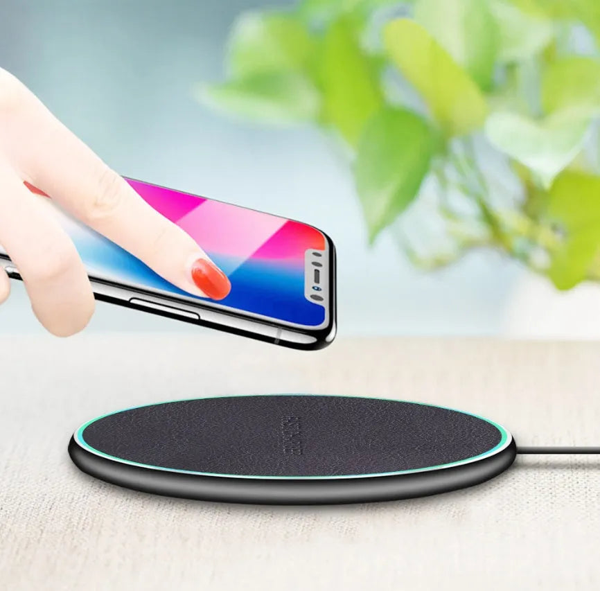 Black Qi wireless fast charger with protective pad for iPhone 11