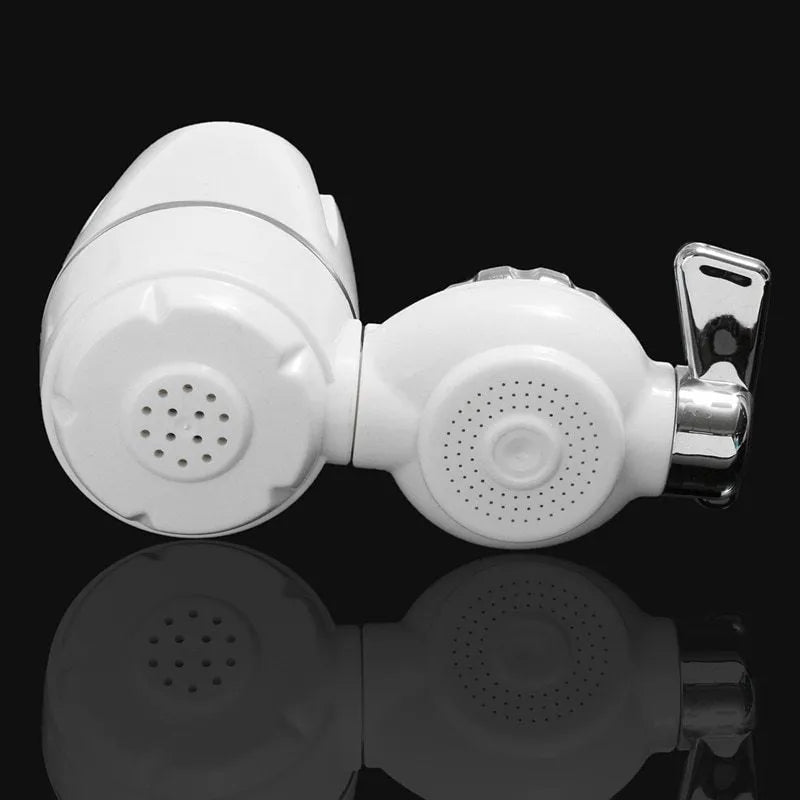 White plastic faucet water filter with adapter kit and ceramic cartridge for kitchen tap installation.