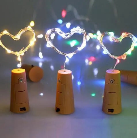 Copper wire LED string light with 20 bulbs inserted into a wine bottle for decorative lighting