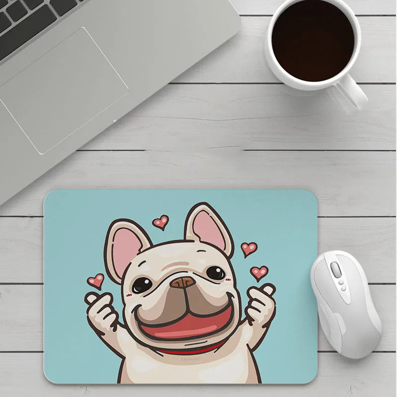 Custom cartoon design on a thickened black mouse pad with stitching, shown on a desk.