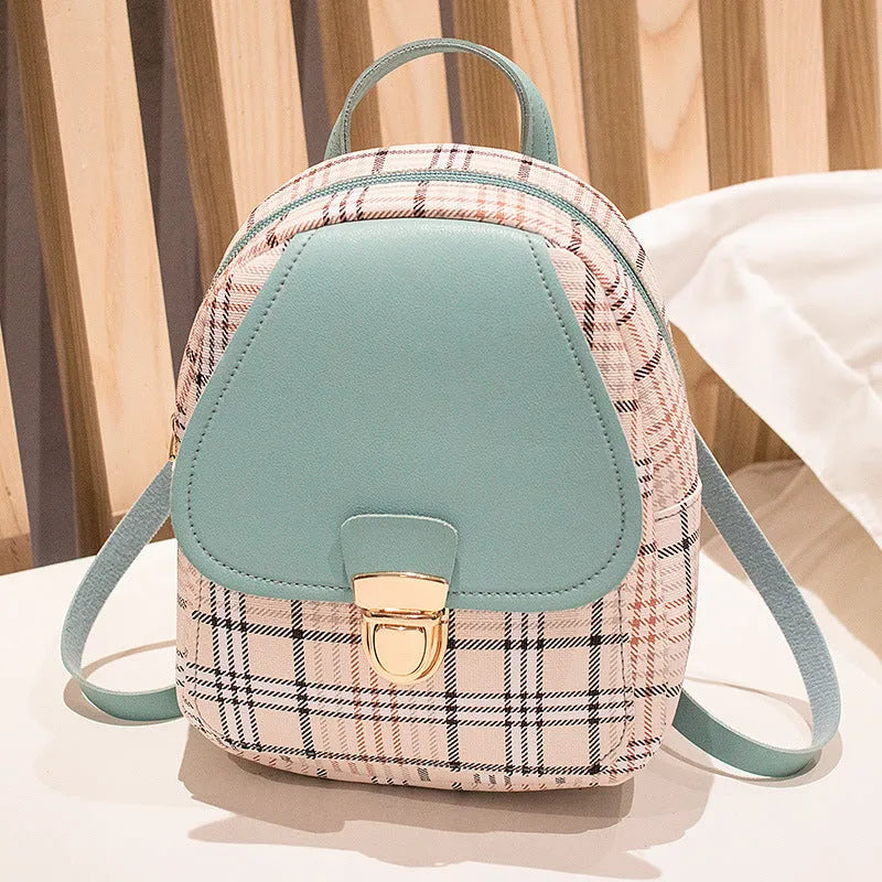 A one shoulder diagonal phone bag in PU fabric, shown in one of five colour options.