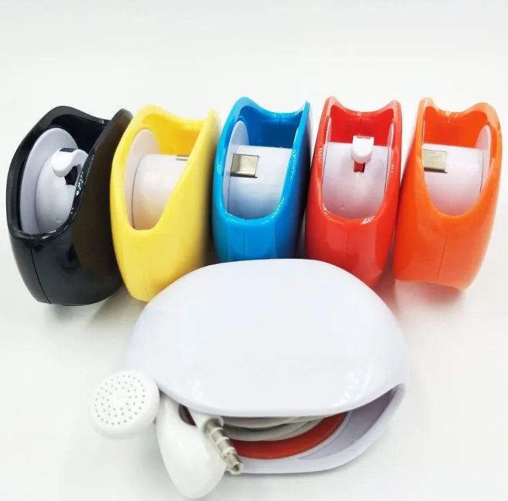 Automatic earphone cable winder retractor in PC ABS plastic, showing compact size and multiple colour options.