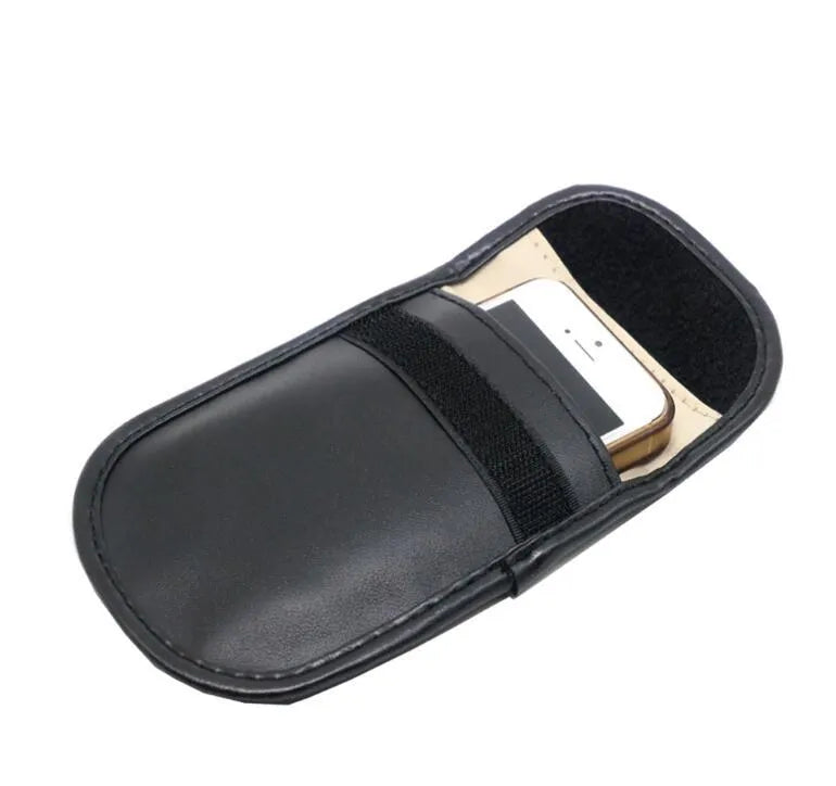 Black microfiber Faraday pouch for car key fobs and RFID cards, measuring 13.5 cm.