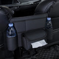 Black leather car seat storage organiser with tissue box between car front seats