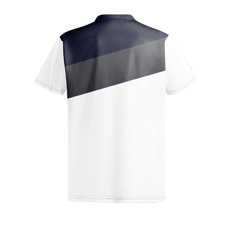 Man modelling a loose-fit grey T-shirt with a colourful 3D digital print pattern on the front.