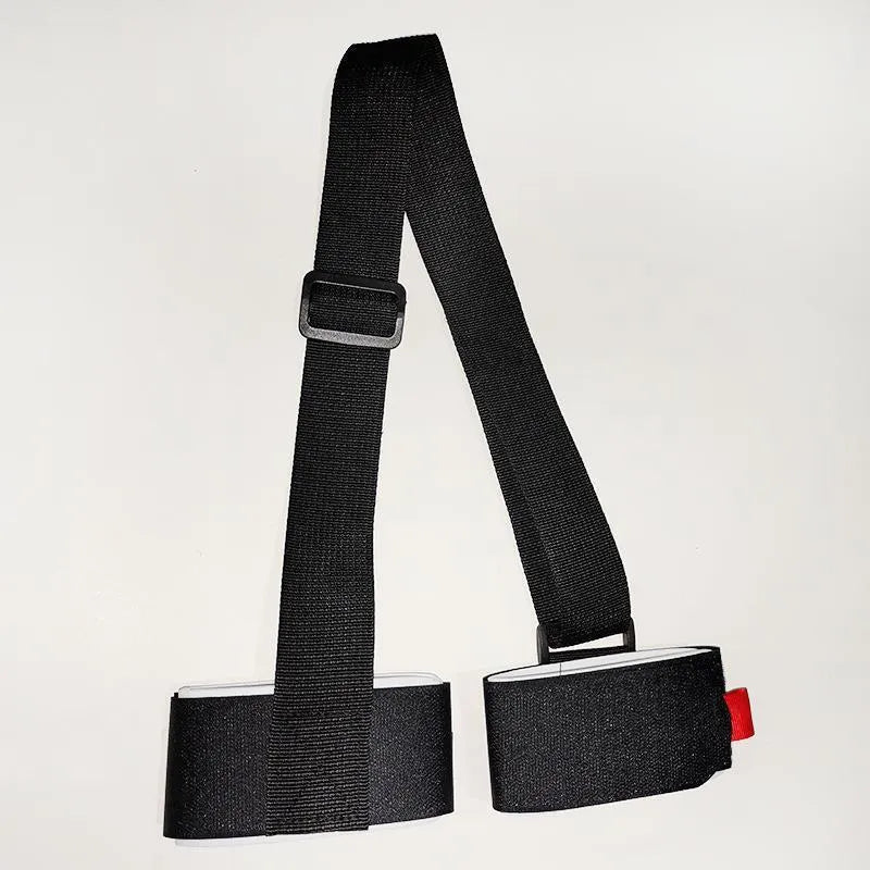 Portable adjustable ski bandage strap in black showing hook and loop fastening system for equipment transport