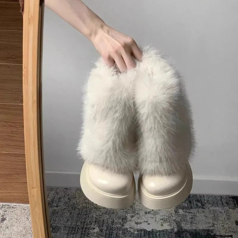 Women's black waterproof snow boots with fleece lining and platform rubber sole