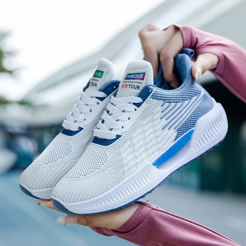 Men's blue casual mesh sports shoes with round toe and plastic sole, shown on a white background.