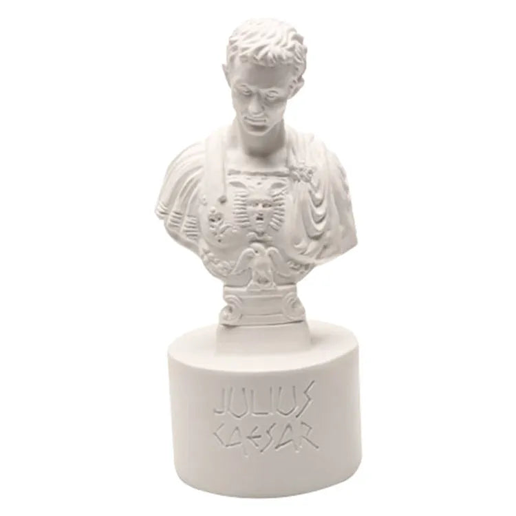White synthetic resin American character pen holder on a desk.