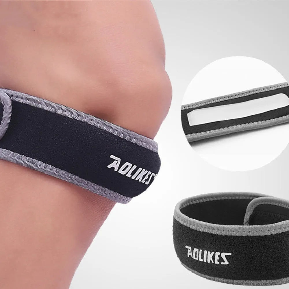 Black and grey patella retinaculum knee support for sports like running and cycling