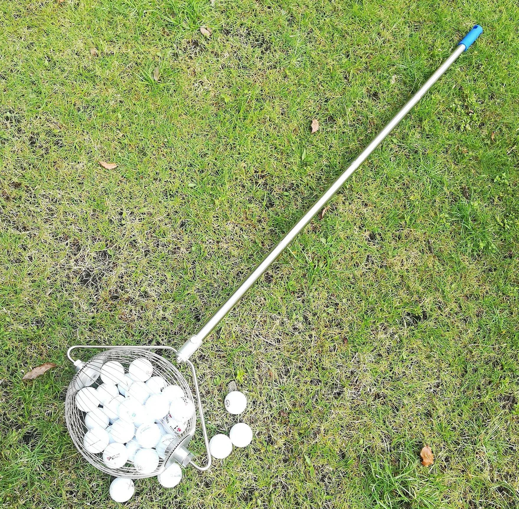 Stainless steel golf ball picker tool in metallic colour for retrieving balls from hazards.