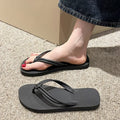 Women's pink flip flops with toe-covering design and non-slip PVC sole for summer outdoor wear