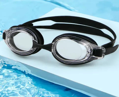 Black myopia swimming goggles with a silicone strap next to a hard protective storage case.